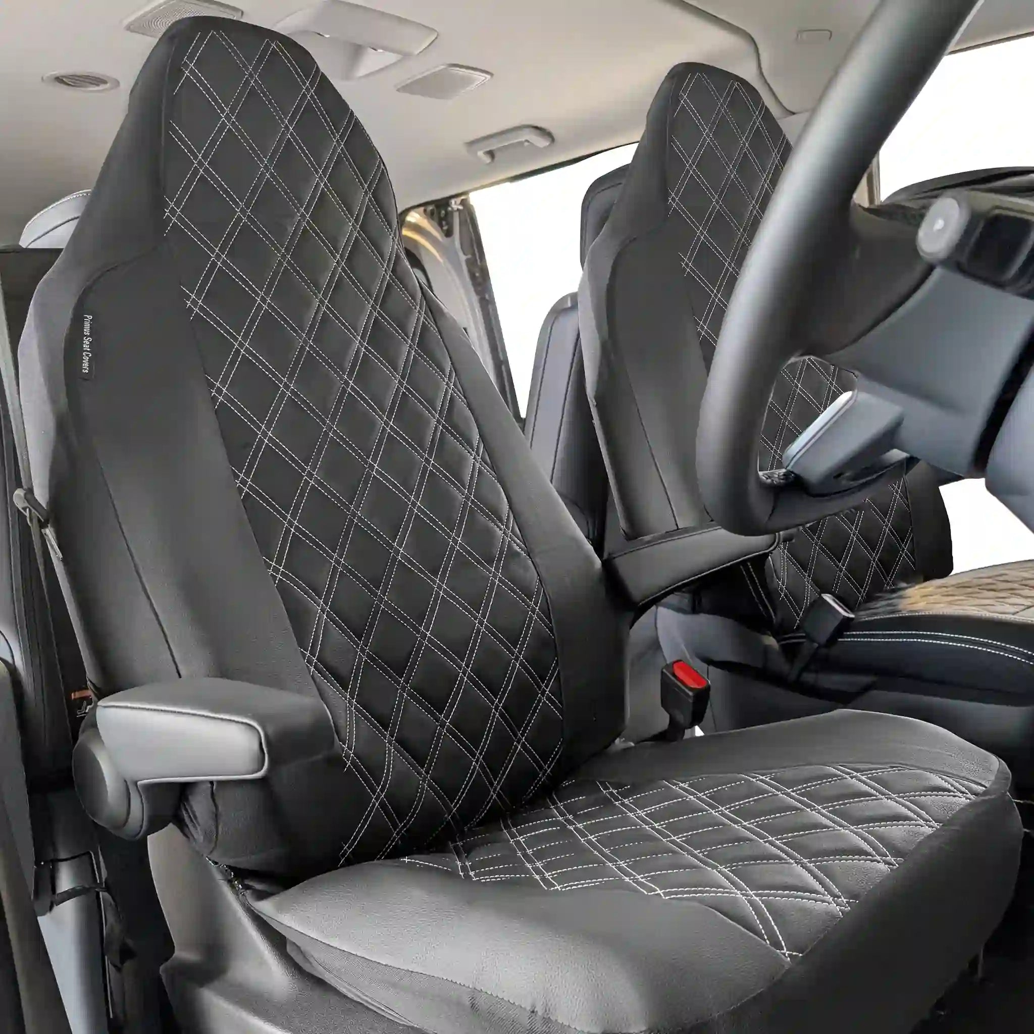 Car interior with Black quilted seat covers