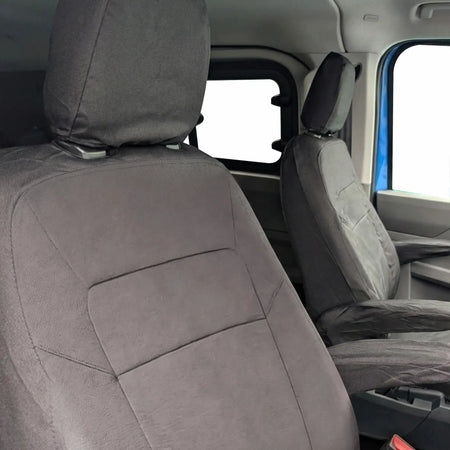 Black  car seat covers on a Volkswagen Transporter Kombi front seats with a clear view of the interior.