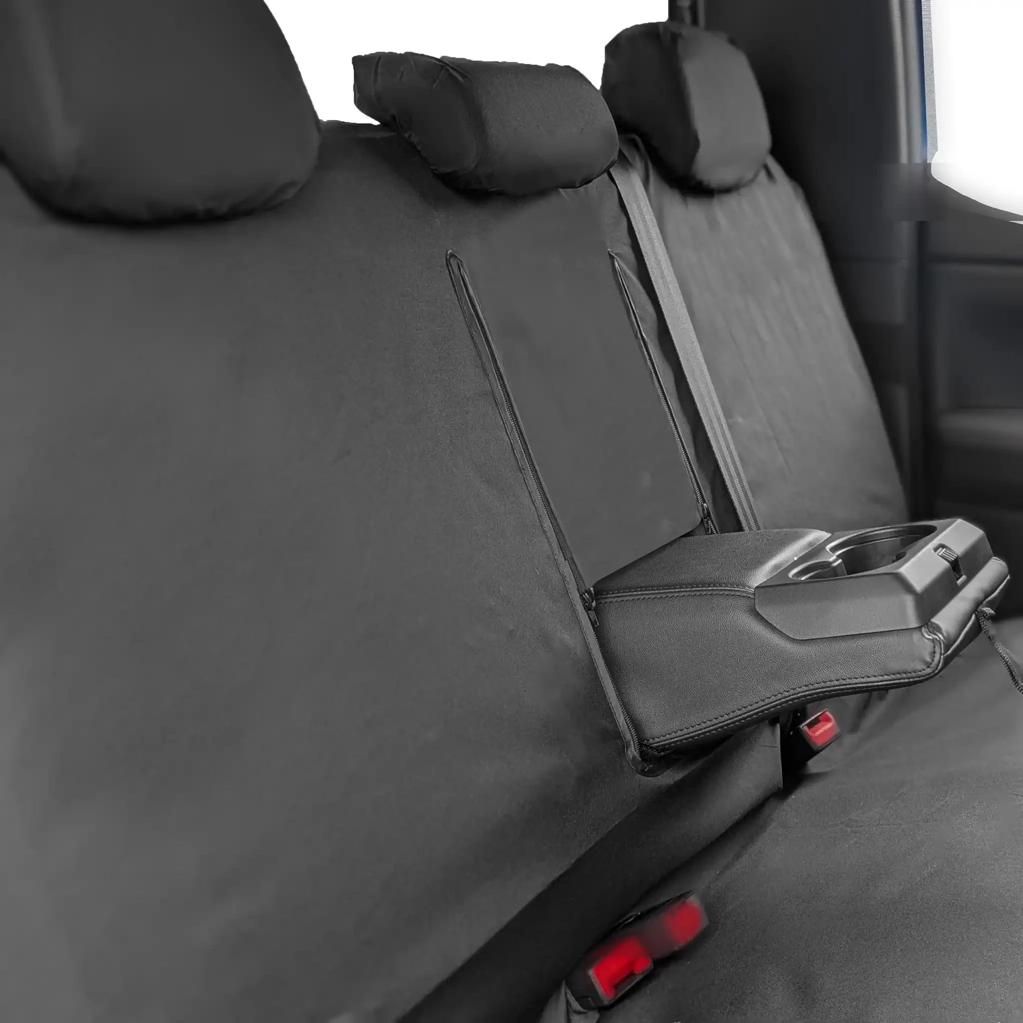 Car seat cover with cup holder and headrests in a vehicle