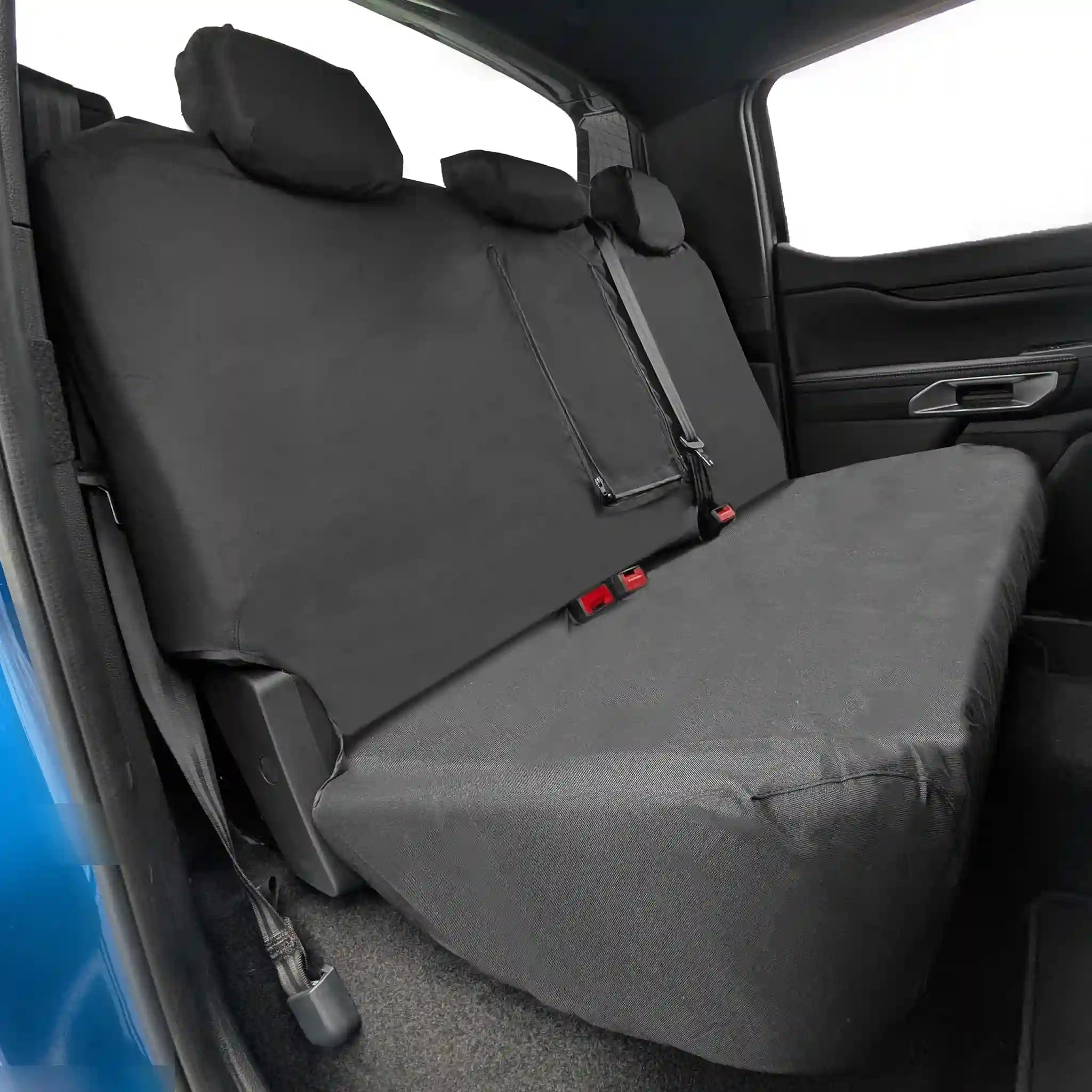 Black Ford Ranger waterproof seat cover on a vehicle's back seat with visible seat belts.