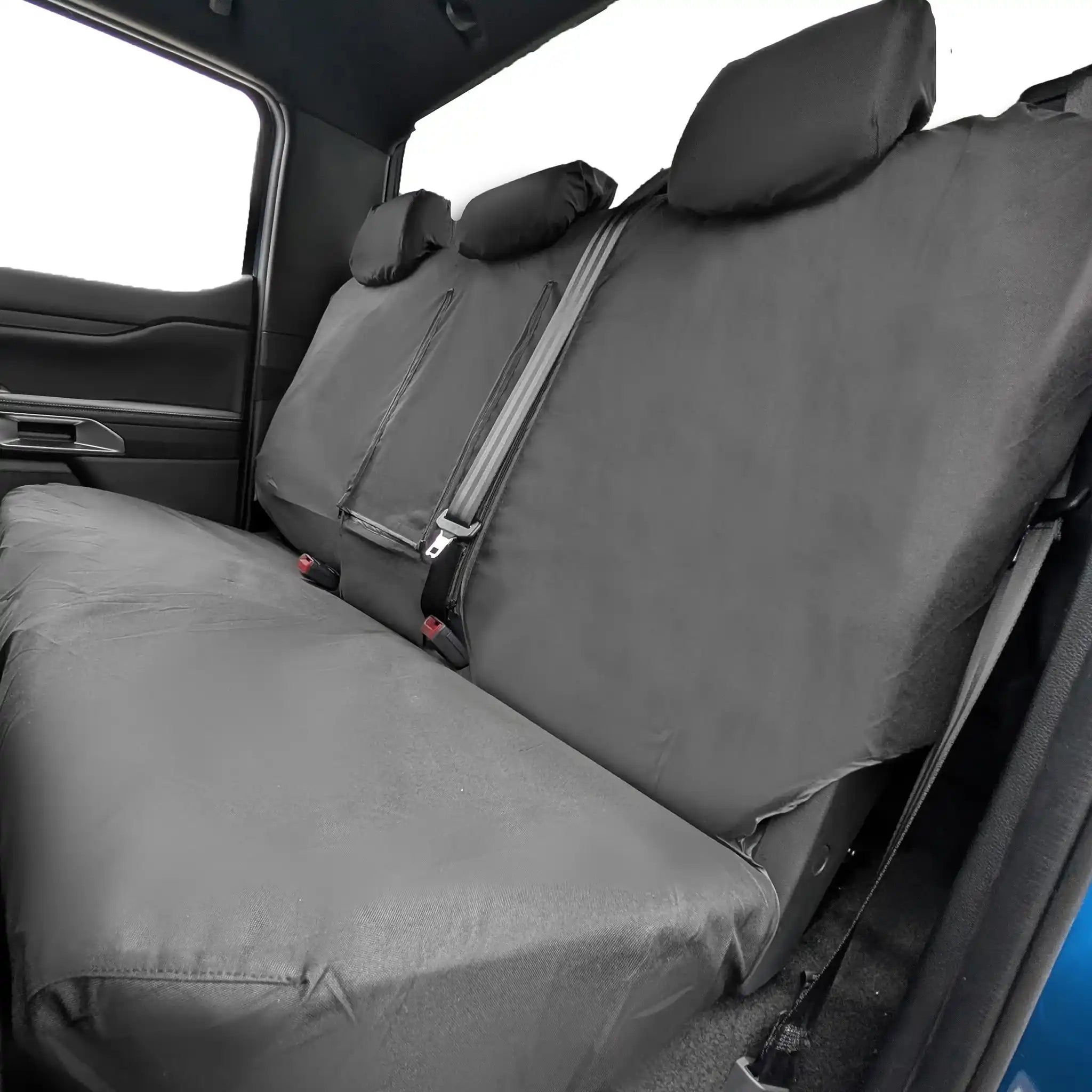 Black Ford Ranger waterproof car seat cover on a vehicle's back seat with a clear background