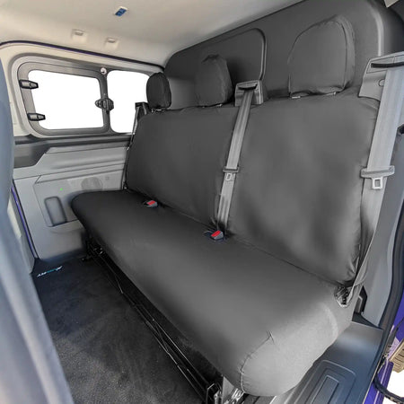 Black Ford Transit Custom rear bench seat cover in a vehicle interior