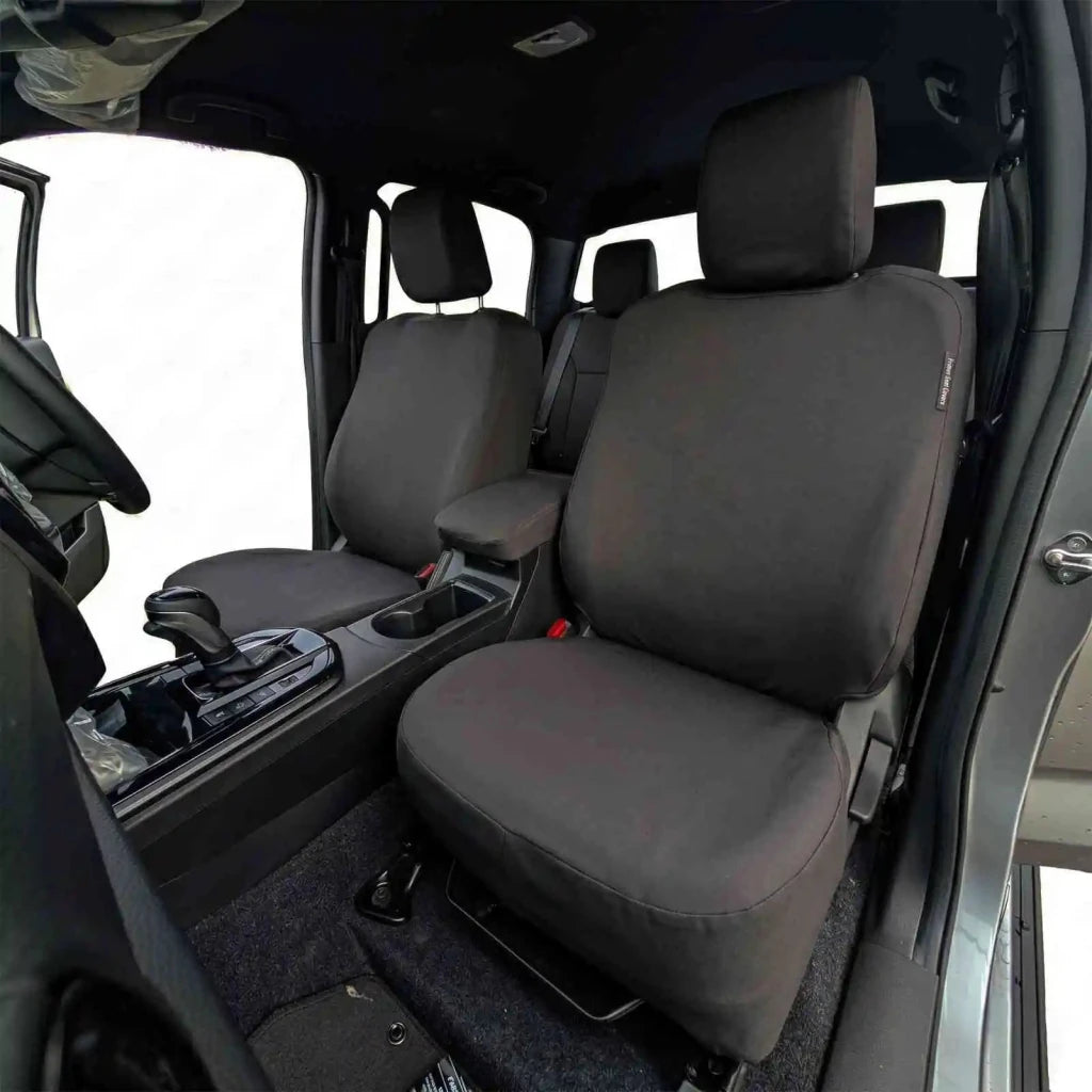 Front pair of seat covers with headrests and contoured seat cushions, dark fabric