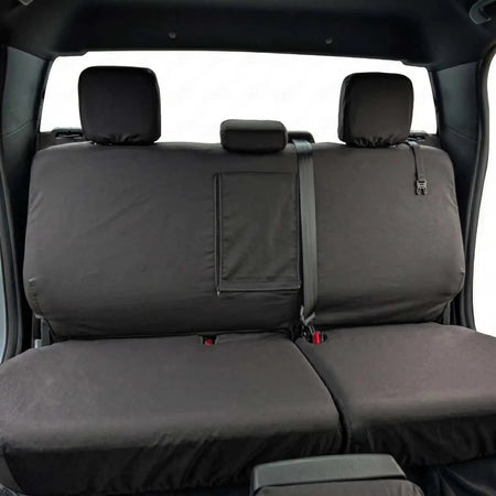 Rear seat cover set with split back panel and integrated headrest covers, dark