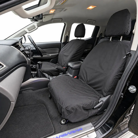 Black front seat covers for driver and single passenger, with headrest cutouts