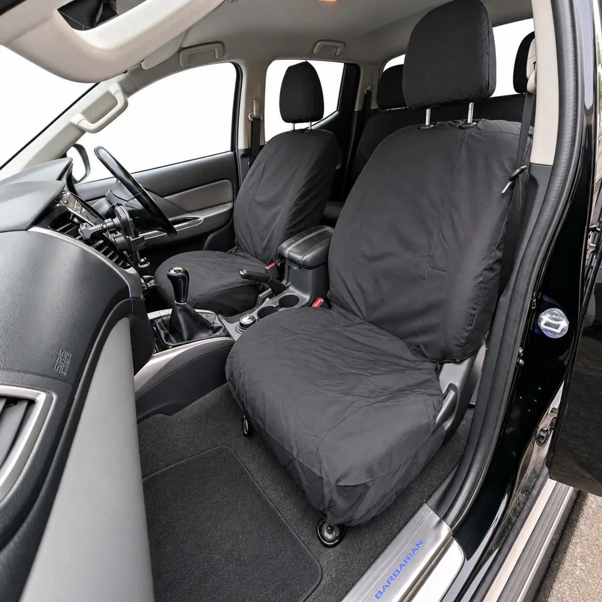 Black driver and passenger seat covers, fitted over seats and headrests