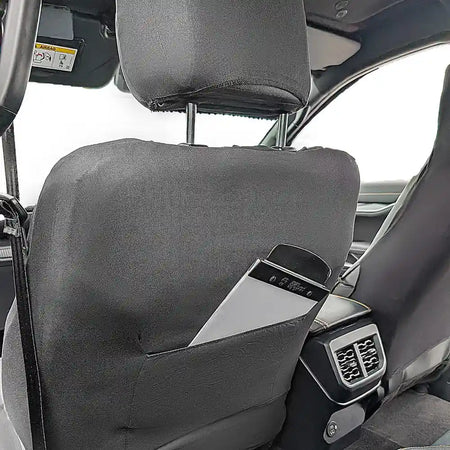 Car back seat cover organizer with pocket on the back of the seat.