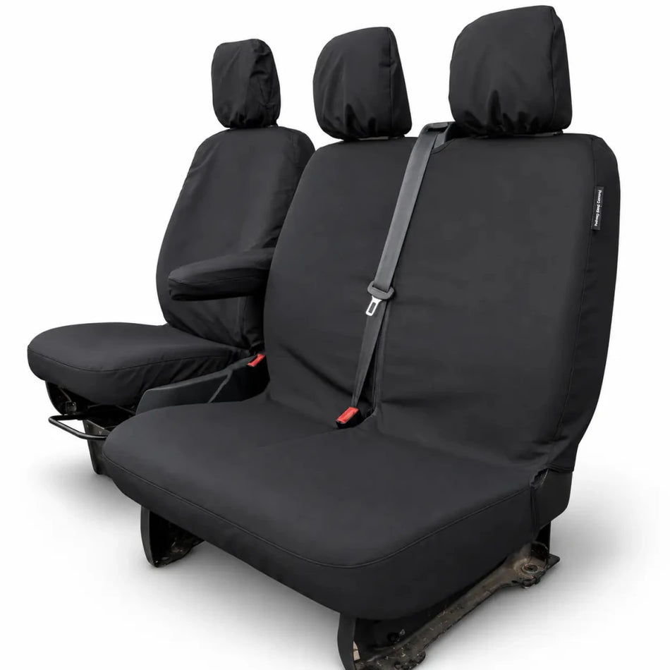 Black tailored seat covers with headrests, seam panels, and red stitching accents