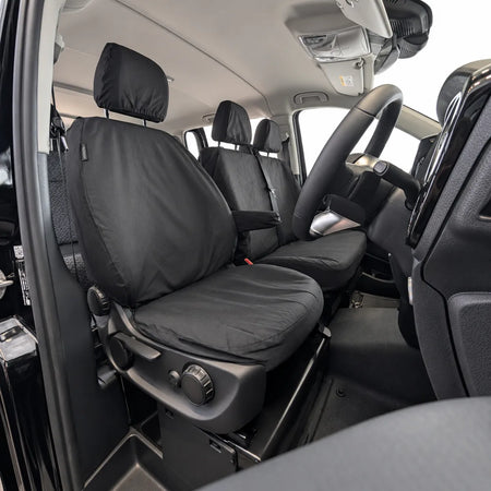 Mercedes Vito driver and passenger seat cover set, black fabric covers with headrests.