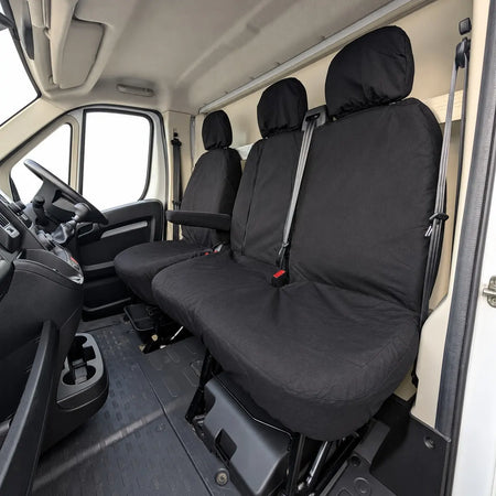 Black fixed-base driver and double passenger seat covers with headrest covers