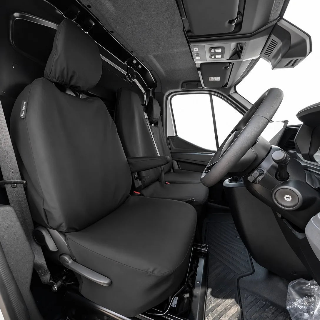 Black front driver seat cover with headrest and armrest, fitted for Renault Master vans.
