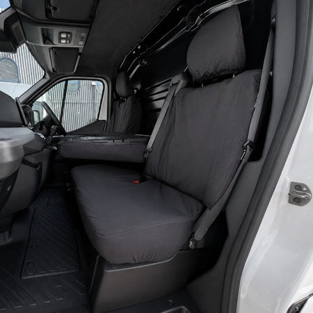 Black folding double passenger seat cover with headrest, armrest, and seatbelt openings.