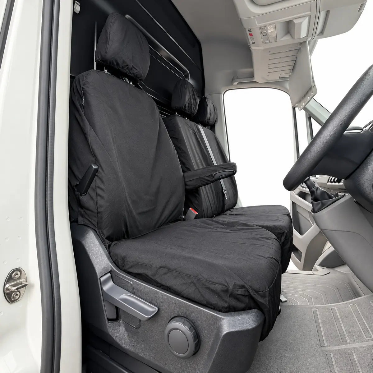 Black VW Crafter driver seat cover with light gray stripe and integrated armrest
