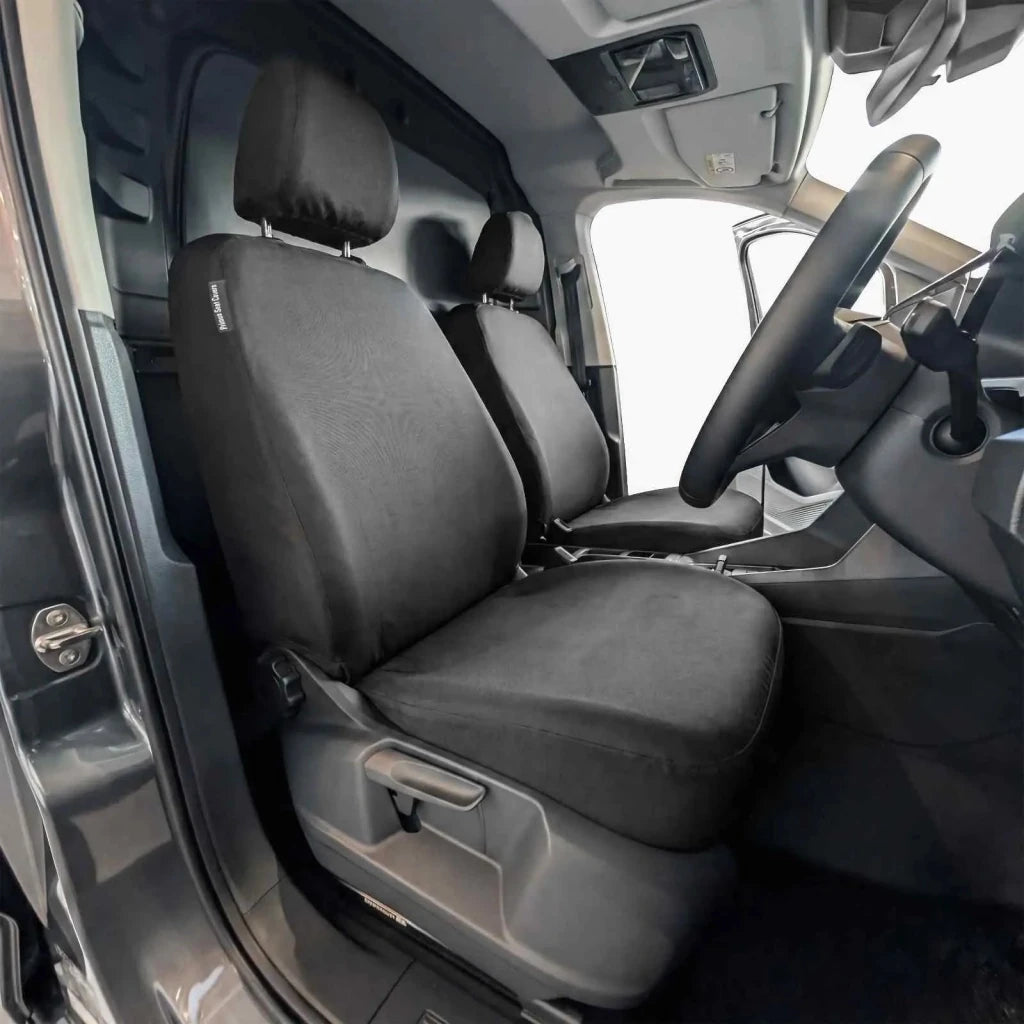 Front driver seat cover with dark gray fabric, headrest, and side grab handle cutouts