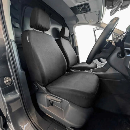 Front driver seat cover with dark gray fabric, headrest, and side grab handle cutouts