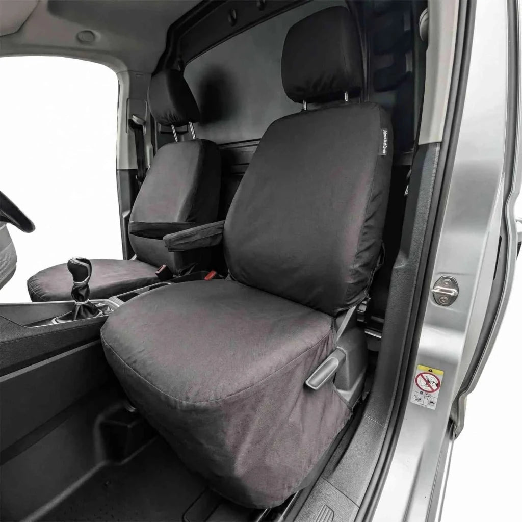 Front seat cover set in dark gray fabric, including driver and passenger headrests