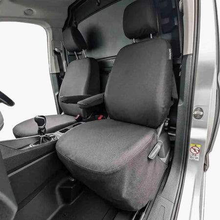 Front driver and passenger seat covers in dark gray fabric with fitted contours
